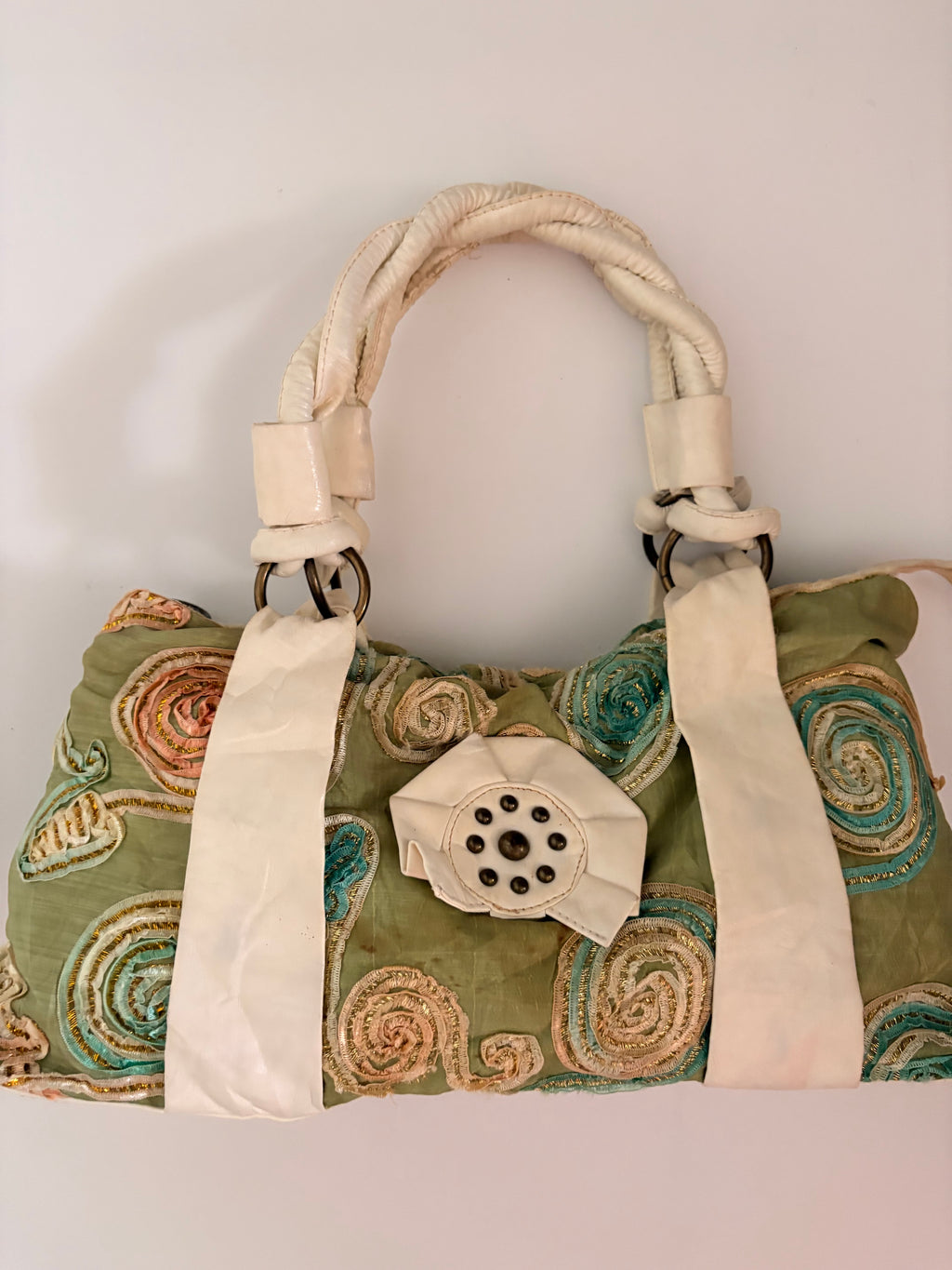 green embroidered bag