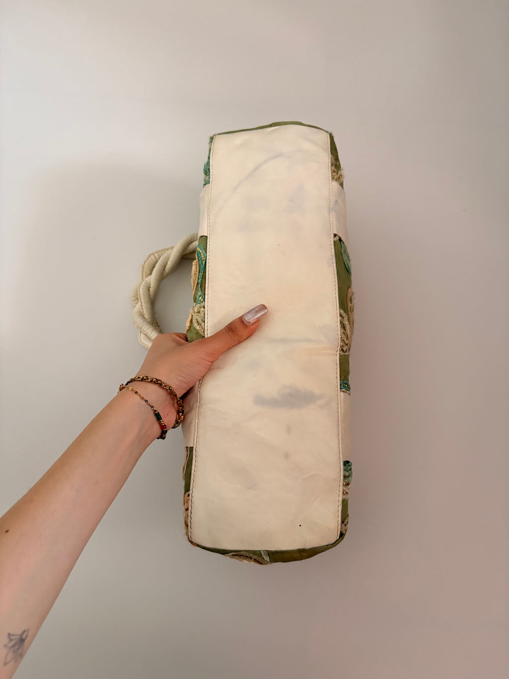 green embroidered bag
