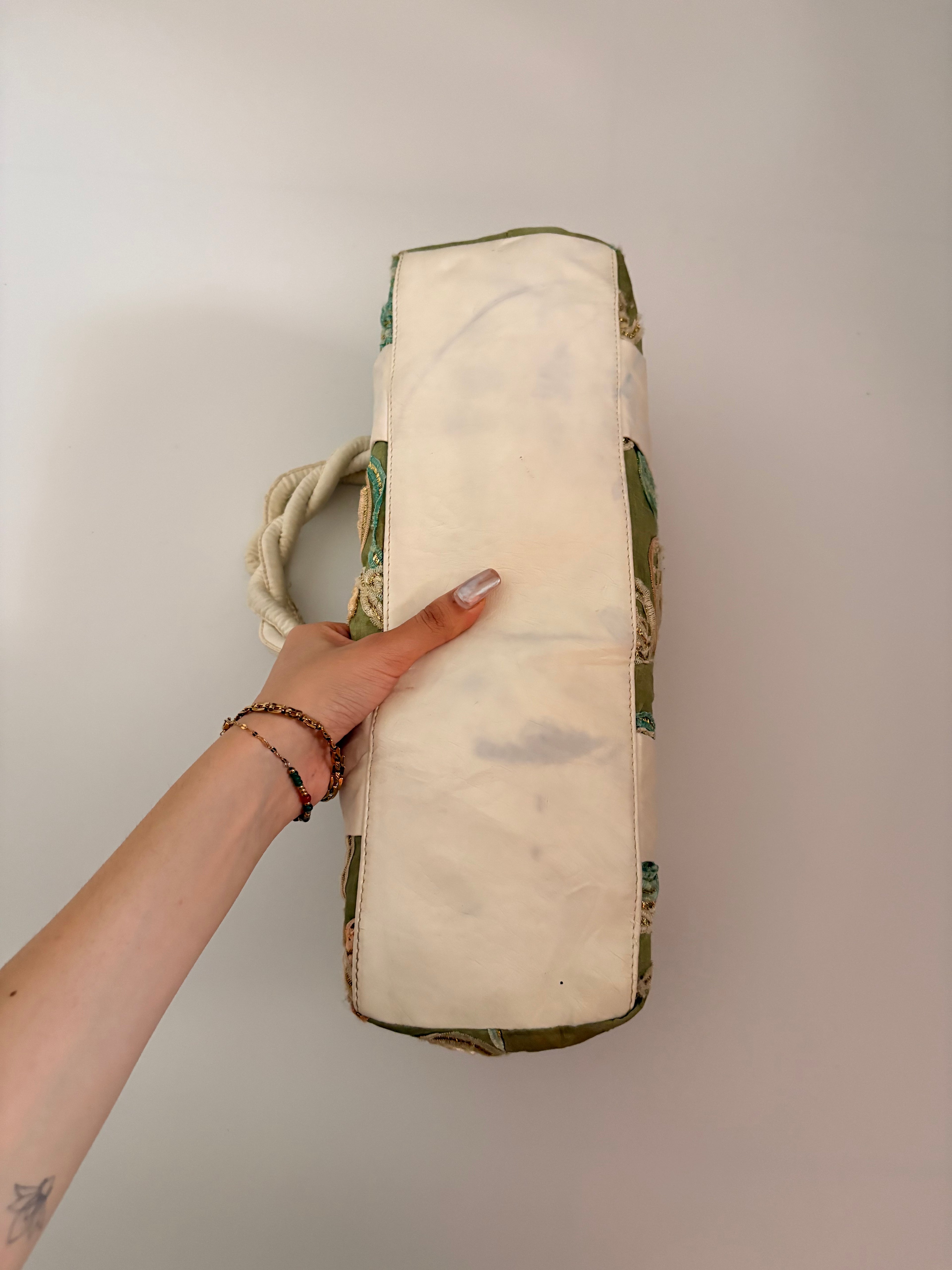 green embroidered bag
