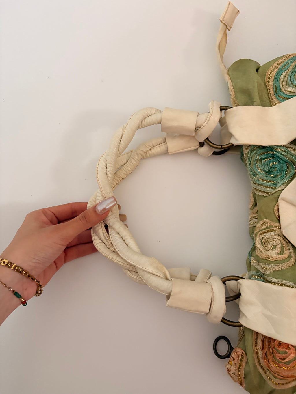 green embroidered bag