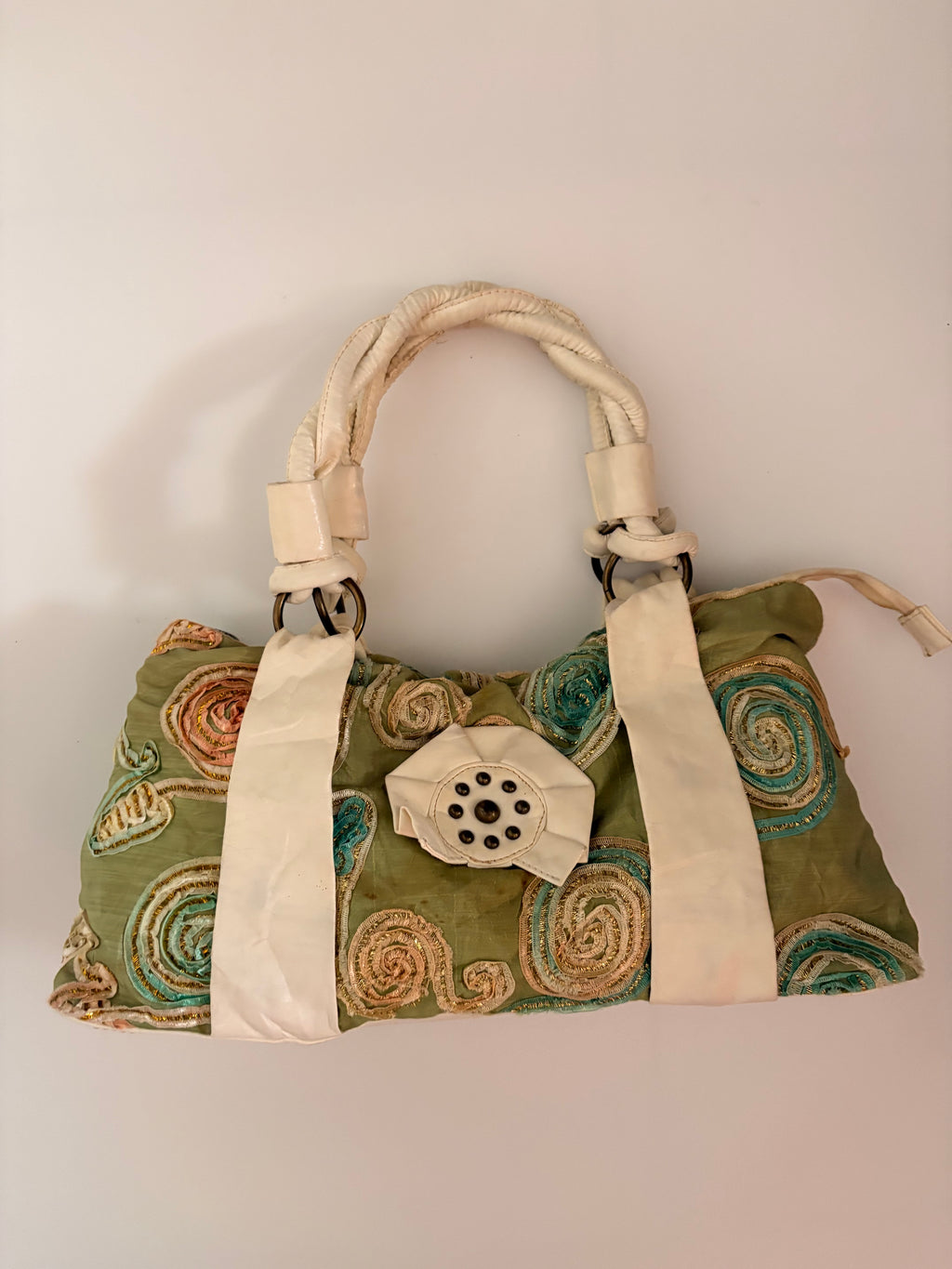 green embroidered bag