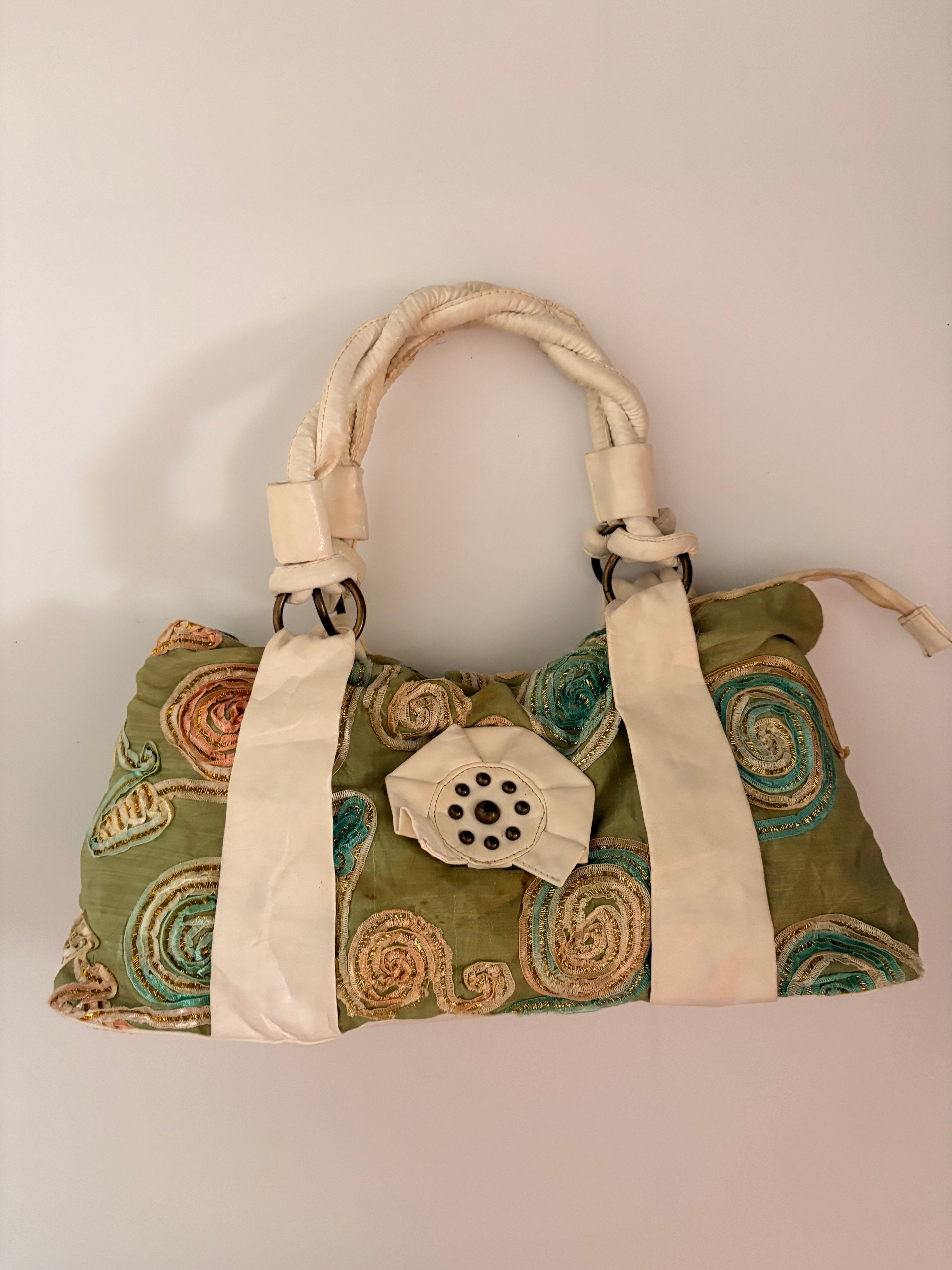 green embroidered bag