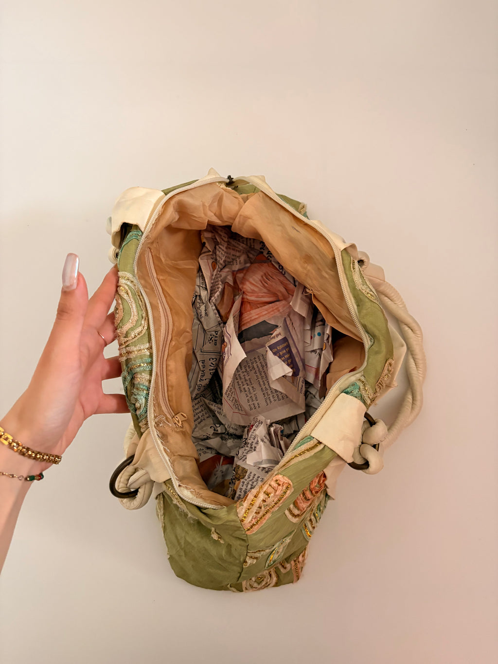 green embroidered bag