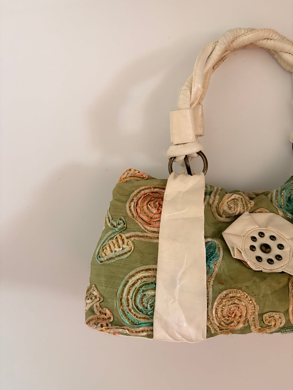 green embroidered bag