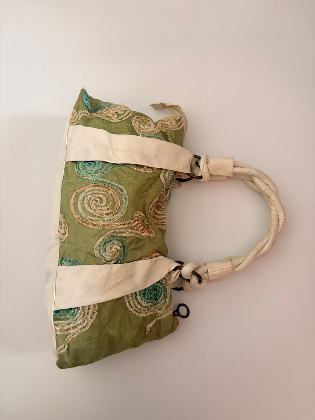 green embroidered bag