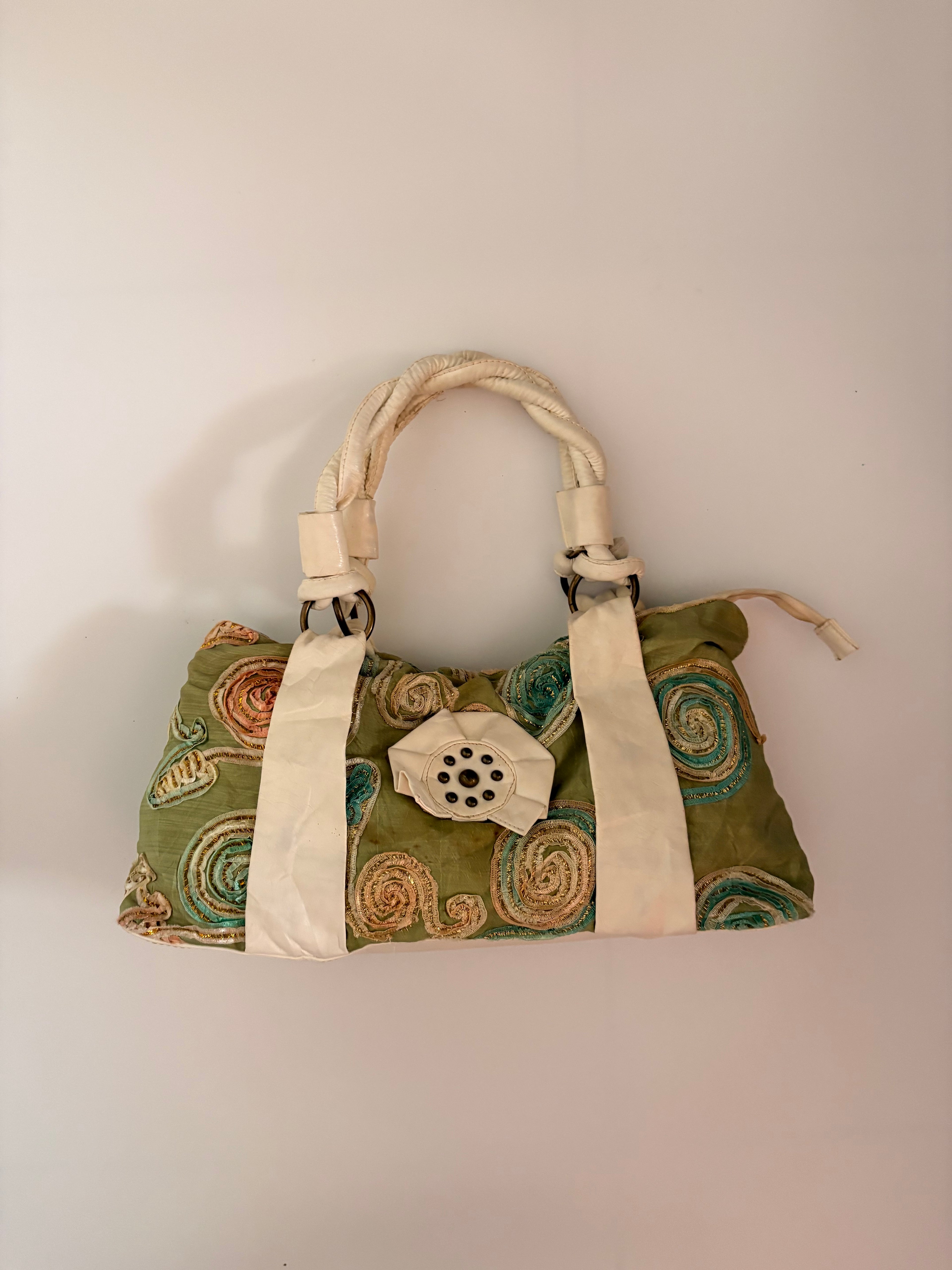 green embroidered bag